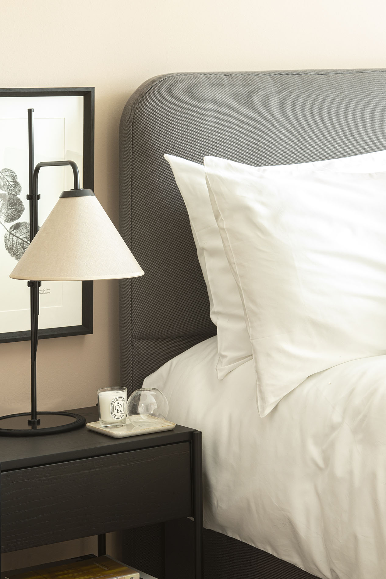 Bedside table with lamp and candle Bedside table with lamp and candle