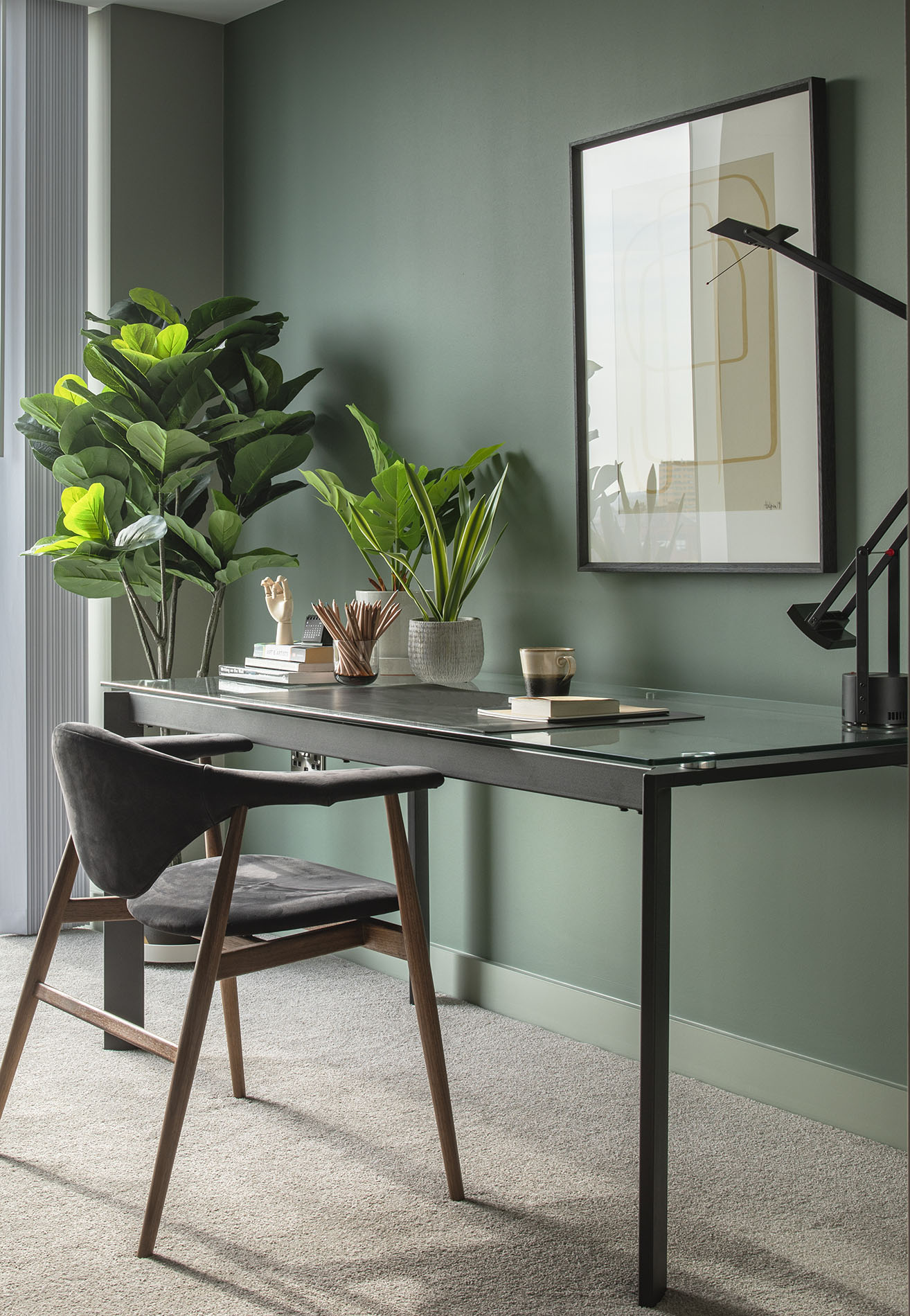 Study desk with chair and houseplants Study desk with chair and houseplants
