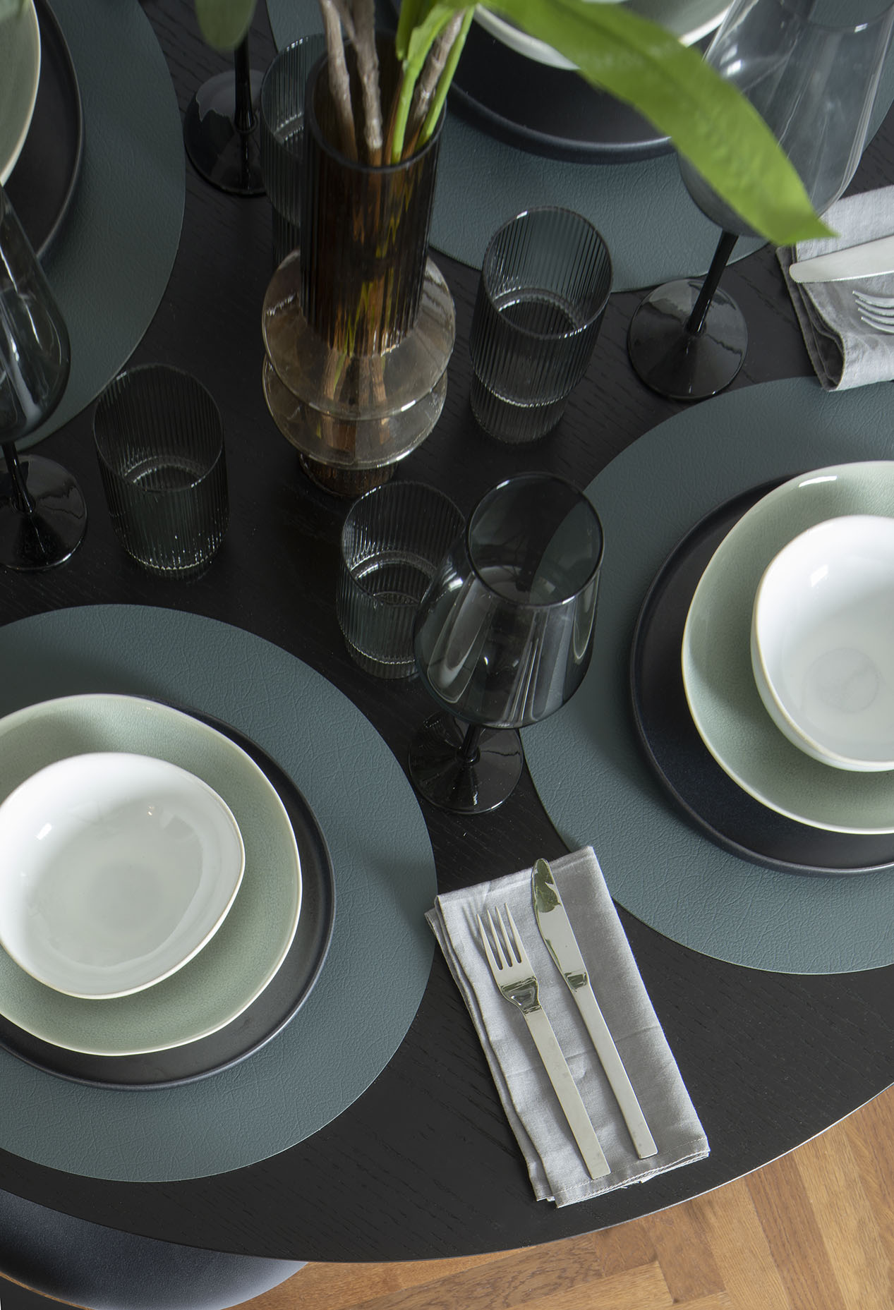 Tableware detail with plates and glasses Tableware detail with plates and glasses