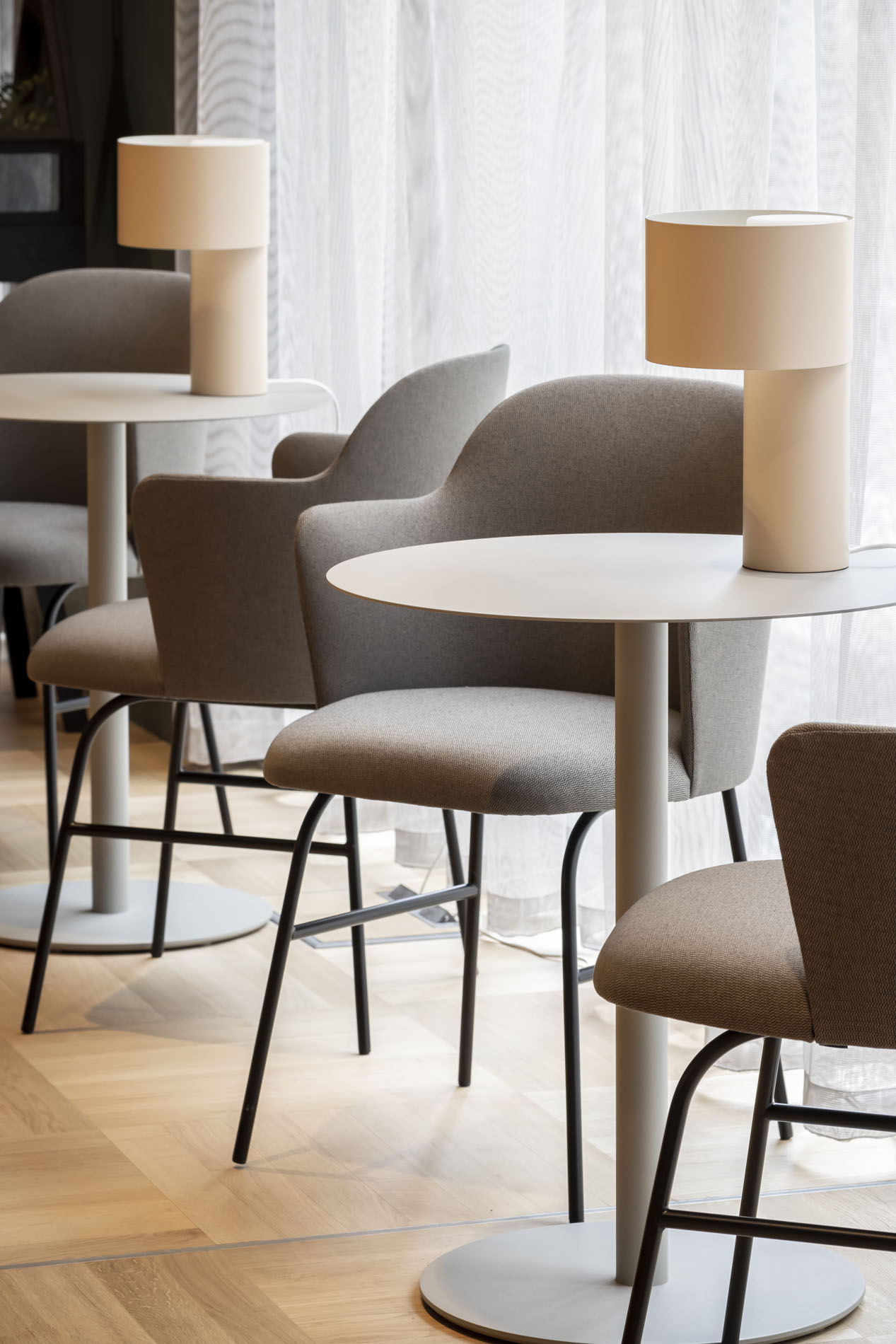 Small tables with chairs and lamps Small tables with chairs and lamps