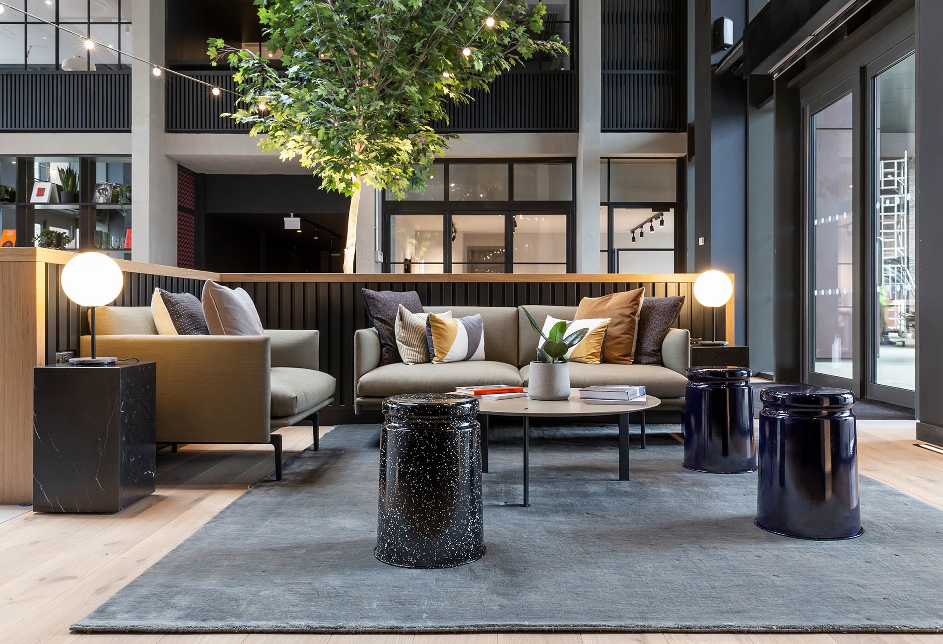 Large lobby area with sofas and table Large lobby area with sofas and table