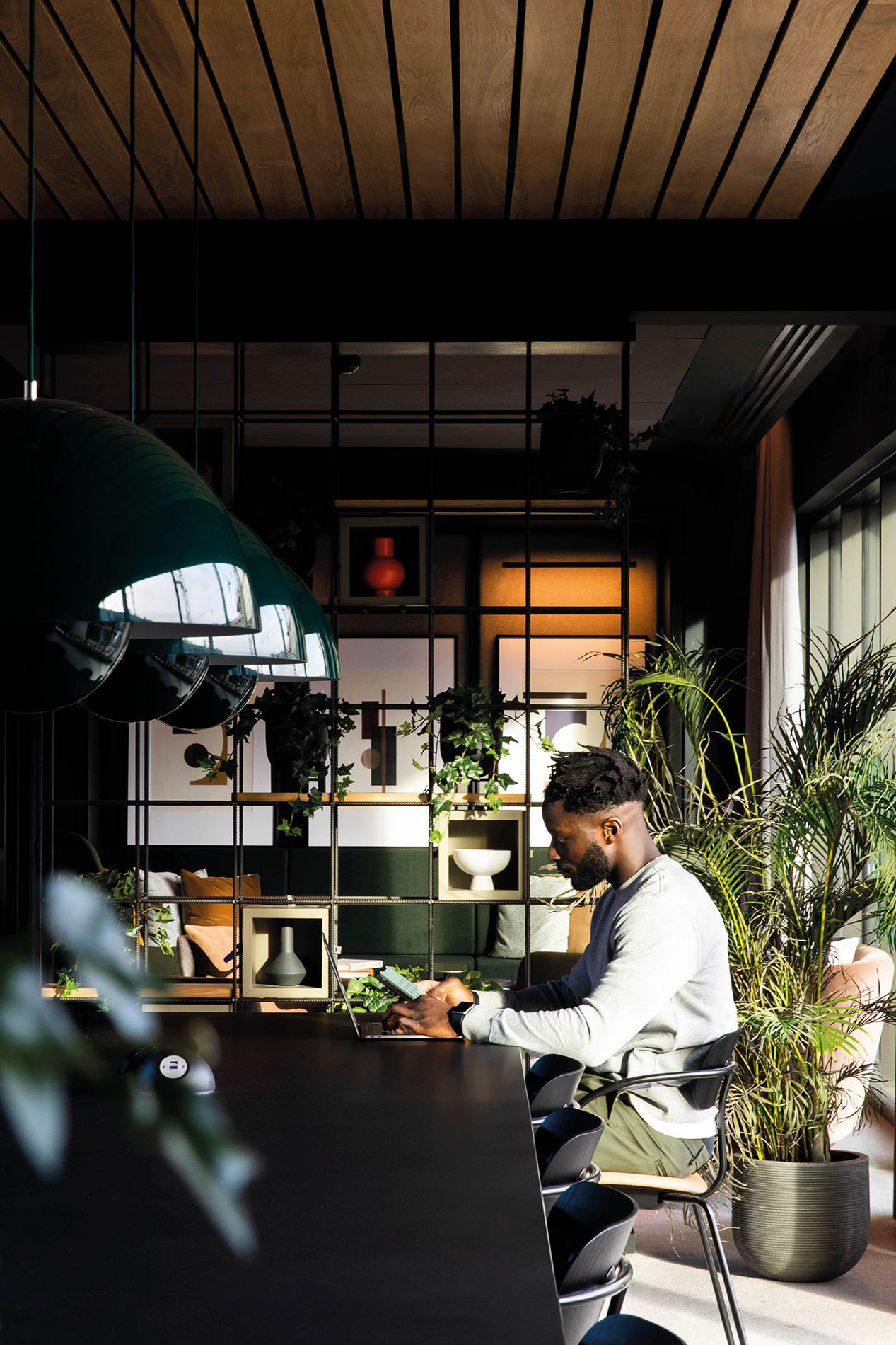 Man sitting at desk working Man sitting at desk working