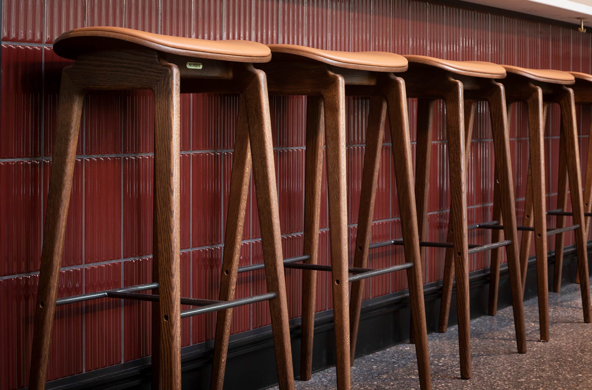 Wooden stools at bar