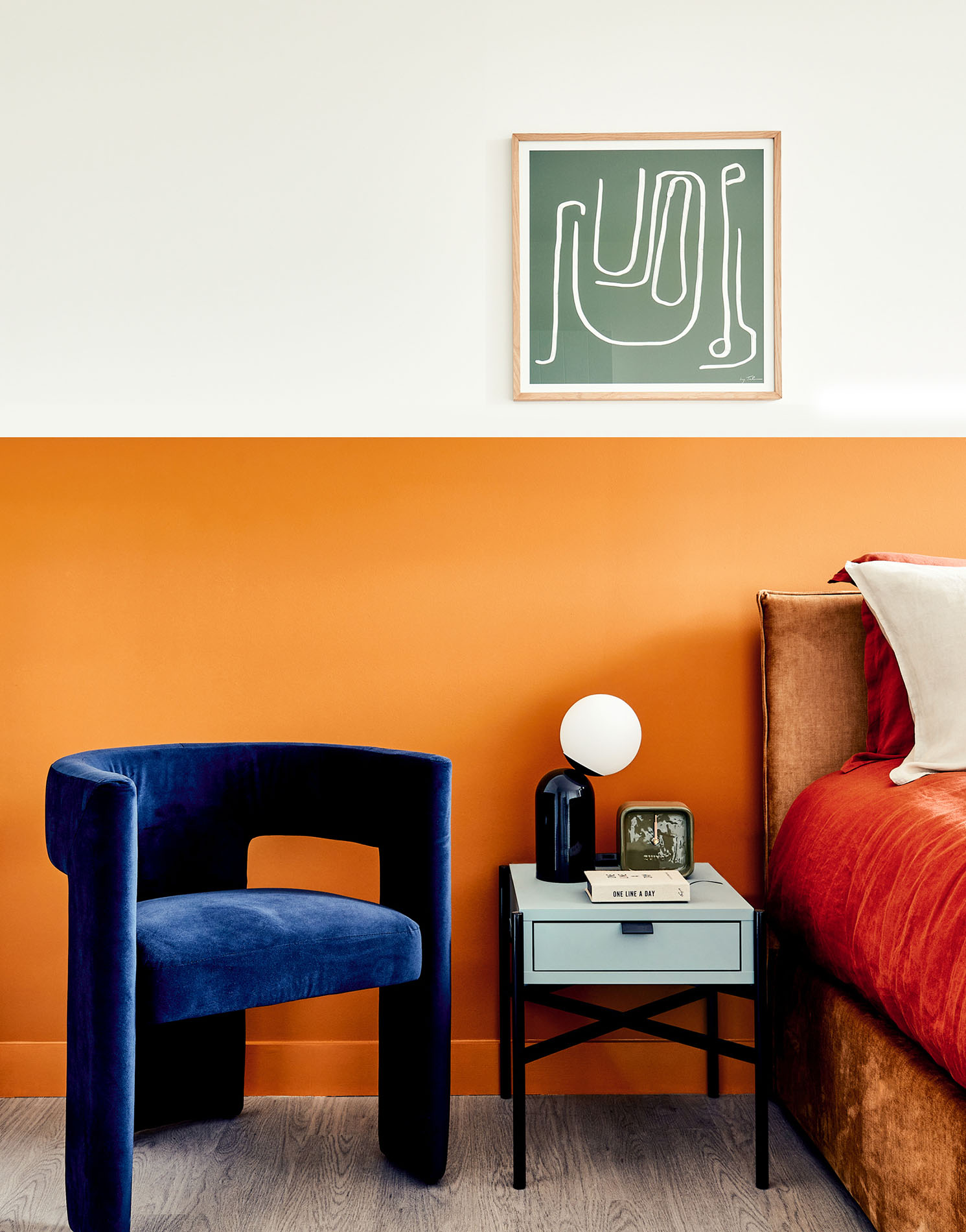 Bedside table with blue chair