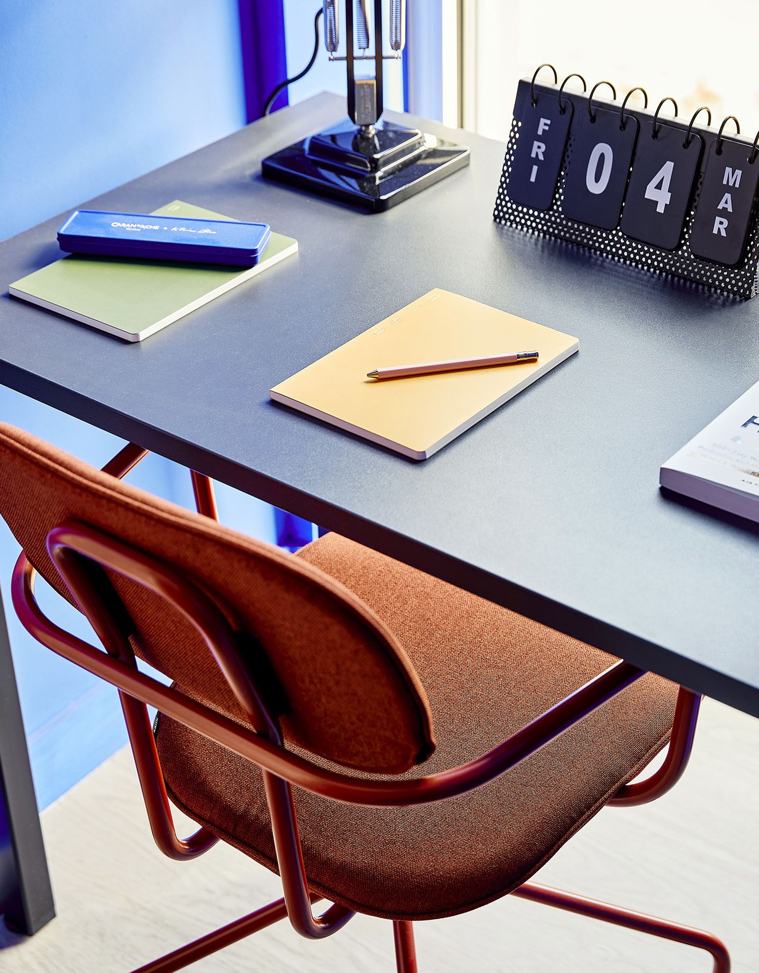Desk with chair notepad and calendar