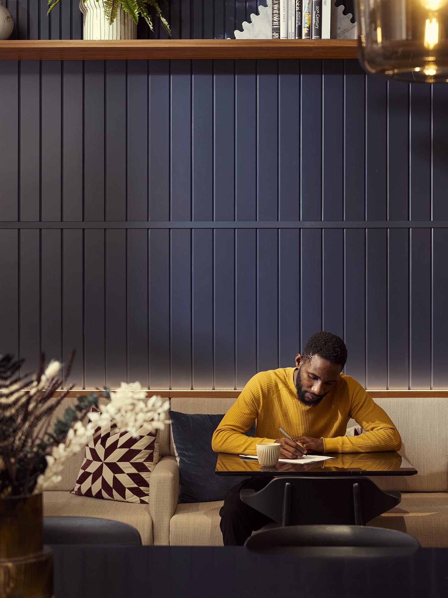 Man Sitting Writing on Paper Man Sitting Writing on Paper